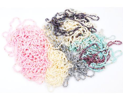 Various fresh water pearl necklaces, in varying colours to include pink, purple, white, blue and grey.
