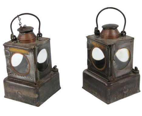 A matched pair of late 19th/early 20thC R D Welch patent LNER railway lanterns, each with square bodies, swing handles and sq