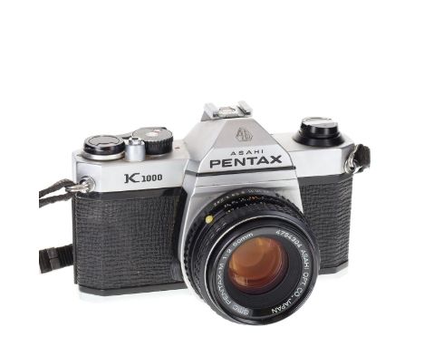 Asahi Pentax - K1000 SLR Film Camera with Pentax-M 50mm F/2 Lens.The camera winds and fires as should, all shutter speeds and