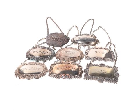 Silver Plated Decanter Label Collection consisting of 8 pieces, including whisky, sherry, gin and port. The items are in good