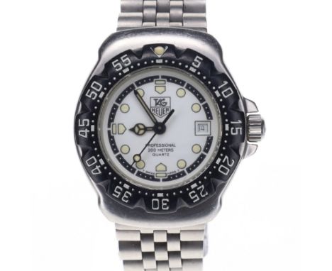 Tag Heuer - Formula 1 Professional 200m Quartz Watch. ETA Cal. 956.112 7 jewel quartz movement. Case back reference code: WA1