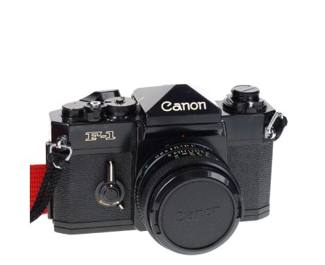 Canon - F-1 SLR Film Camera with FD 50mm F/1.8 Lens and Original Manuals.The camera winds and fires as should, all shutter sp