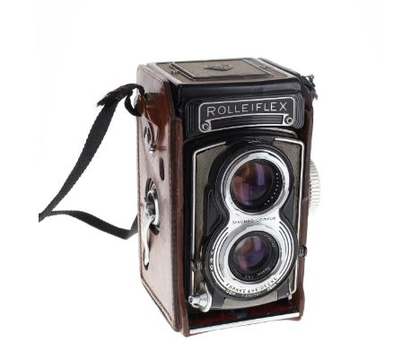 Rolleiflex -  K8 T1 Medium Format Twin Lens Film Camera with Rolleiflex Half Case.The lenses and viewfinder may require a cle