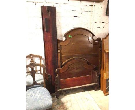 A 1930s/40s mahogany bed, with headboard, footboard and side rails (headboard: 142cm x 101cm)