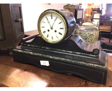 An Edwardian slate mantel clock, the circular dial with roman numerals, on scroll supports and tiered base (30cm x 50cm x 16c