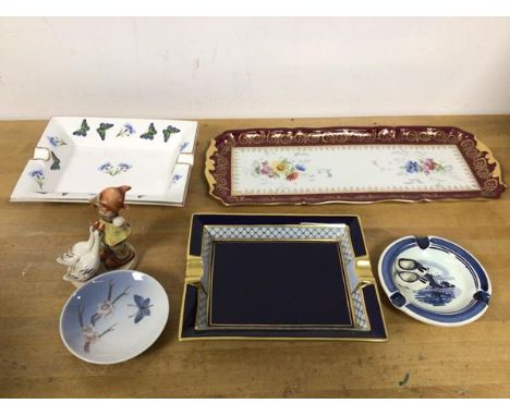 A mixed lot including a Limoges ashtray in classical taste (20cm x 16cm) and a Limoges tray with foliate decoration, two furt