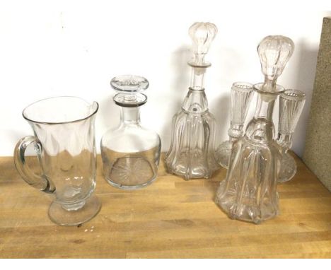 A pair of bell glass decanters (each: 31cm), a mallet shaped decanter, etched Sherry, a footed jug and two cut glass vases (6