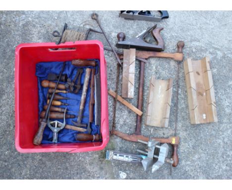 An early 20th century fret saw and a number of other hand tools
