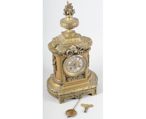 A 19th century brass cased mantel clock, in the manner of Japy Freres, with enamelled Roman numerals and striking movement, 1