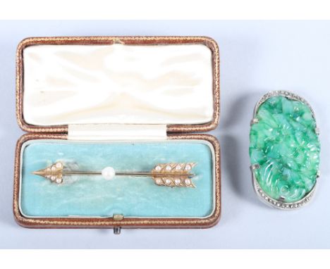 A gilt metal and seed pearl bar brooch, in the form of cupid's arrow, together with a  brooch, on silvered mount