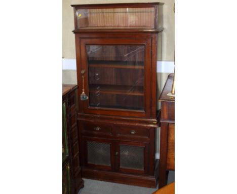 A late Victorian side cabinet, fitted lazed top over glass panel door and cupboards, on block base, 60" x 28" 