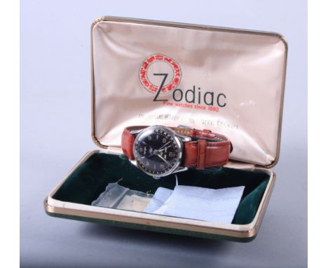 A gentleman's 1970s Zodiac automatic wristwatch, on leather strap, with box and papers, two stainless steel wristwatches, a w