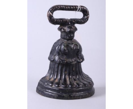 A painted cast iron door stop by A K & Sons, 7" high