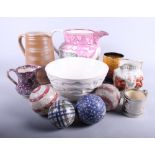 Various decorative ceramics, including an 1820s Staffordshire mask jug, a larger Sunderland lustre