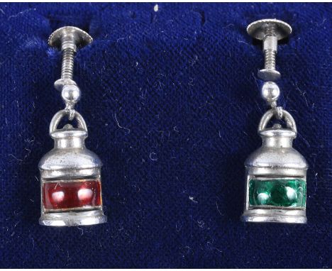 A pair of early 20th century silver and enamel earrings, in the form of port and starboard lamps
