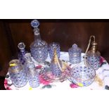 A quantity of moulded blue and clear glass dressing table appointments