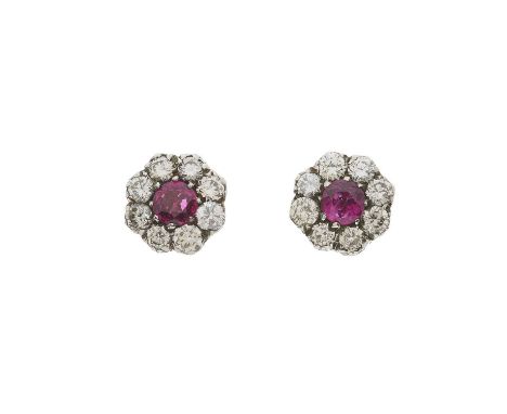 A pair of silver and gold, ruby and brilliant-cut diamond floral cluster stud earrings, estimated total diamond weight 0.80ct