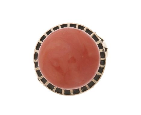 A mid 20th century gold, coral cabochon single-stone ring, with foliate grooved shoulders, coral measures approximately 16.5m