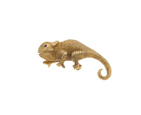 An early 20th century gold brooch, realistically modelled as a textured chameleon, with ruby eye, length 2.8cm, 8.8gOverall g