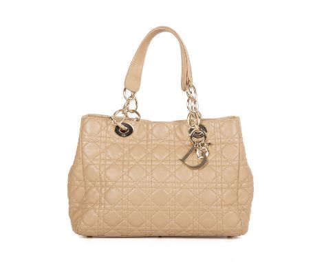 Christian Dior, a Soft Lady Dior tote, featuring the marker's signature cannage quilting to the beige leather exterior, with 