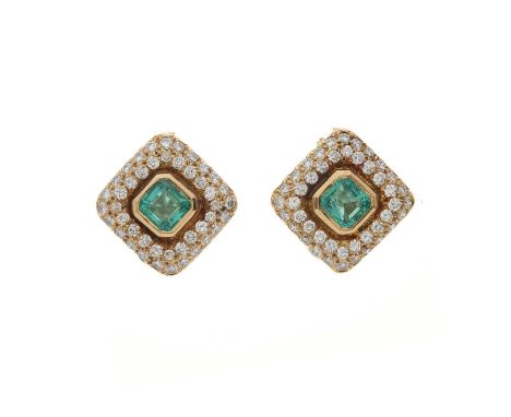 An exceptional pair of 18ct gold Colombian emerald and brilliant-cut diamond cluster clip earrings, with report from GCS stat