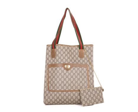 Gucci, a GG Plus supreme tote with matching purse, crafted from the maker's GG Plus coated canvas, featuring a front patch po