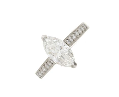 A platinum marquise-shape diamond single-stone ring, with brilliant-cut diamond line shoulders, principal diamond estimated w