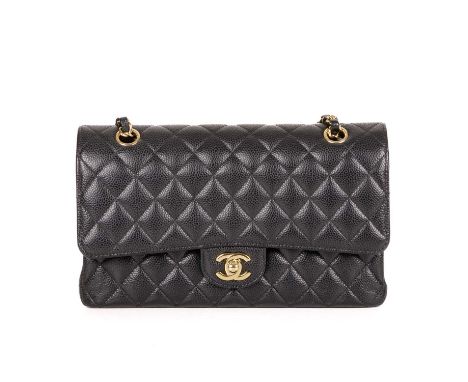 Chanel, a medium Classic Double Flap handbag, designed with a diamond quilted black caviar leather exterior, with gold-tone h