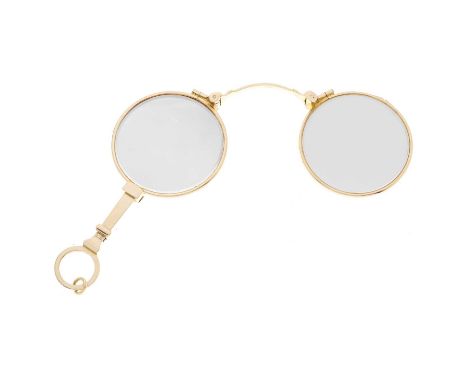 A pair of early to mid 20th century 14ct gold lorgnette folding glasses, mount stamped 14K, folded length 8.5cm, total weight