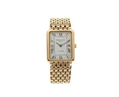 Patek Philippe, an 18ct gold bracelet watch, retailed by Howes, signed manual wind movement, Swiss convention marks, fitted t