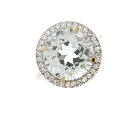 An 18ct gold aquamarine and brilliant-cut diamond cluster ring, with slightly tapered shoulders, aquamarine weight 6.71ct, to