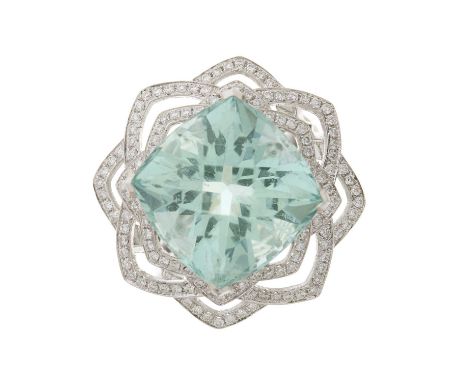 An 18ct gold aquamarine and brilliant-cut diamond cocktail dress ring, with brilliant-cut diamond line shoulders, aquamarine 