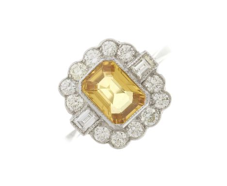 A platinum yellow sapphire and brilliant-cut diamond cluster dress ring, with rectangular-shape diamond sides, sapphire estim