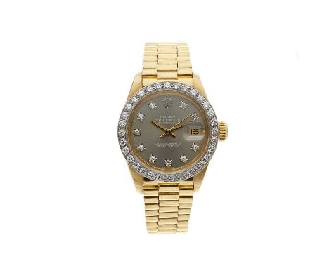Rolex, an 18ct gold Oyster Perpetual Datejust bracelet watch, circa 1982, factory diamond set dial, diamond bezel, reference 