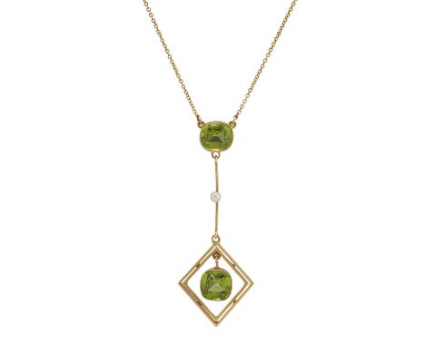 An Edwardian 15ct gold cushion-shape peridot drop pendant, with similarly-shaped peridot surmount and knife-edge seed pearl a