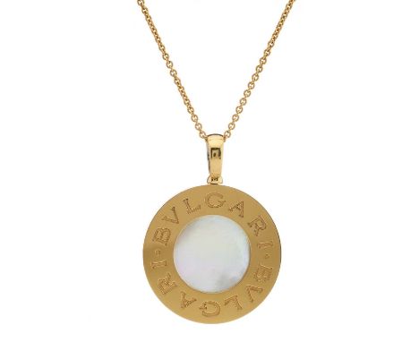 Bulgari, an 18ct bi-colour gold, mother-of-pearl and onyx Bulgari Bulgari double sided pendant, suspended from a signed 18ct 