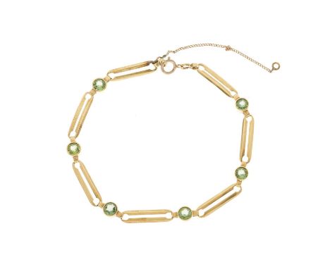 A gold circular-shape peridot line bracelet, with openwork spacers and later 9ct gold spring ring clasp, foreign marks, lengt