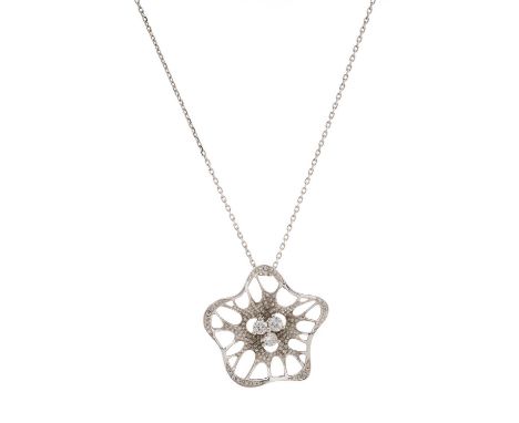 An 18ct gold pave-set diamond floral openwork pendant, with brilliant-cut diamond trio central highlight, suspended from a si