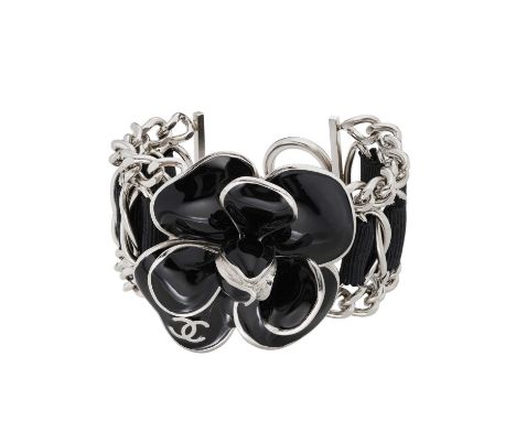 Chanel, an enamel Camellia flower chain-link bracelet, the silver-tone metal and black enamel camellia flower to the centre, 