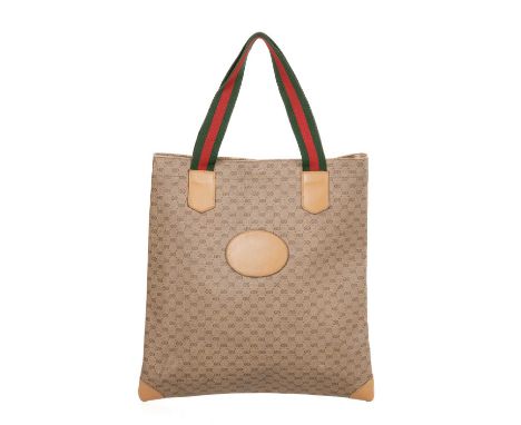 Gucci, a vintage tote, featuring the maker's micro monogram coated canvas exterior, with smooth camel leather trim, red and g