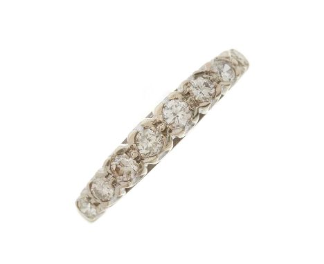 An 18ct gold graduated brilliant-cut diamond half eternity band ring, estimated total diamond weight 0.25ct, K-L colour, SI c