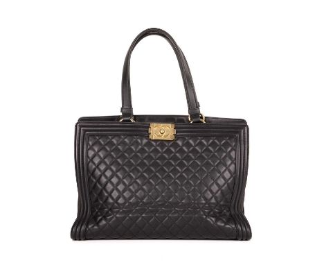 Chanel, a Boy tote, designed with a black diamond quilted leather exterior with ribbed leather trim, gold-tone hardware, dual