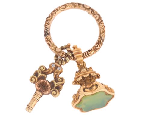 An Antique Georgian Regency Fob,circa 1820, comprising a shaped plain seal fob with inset green glass, a Regency shell pocket