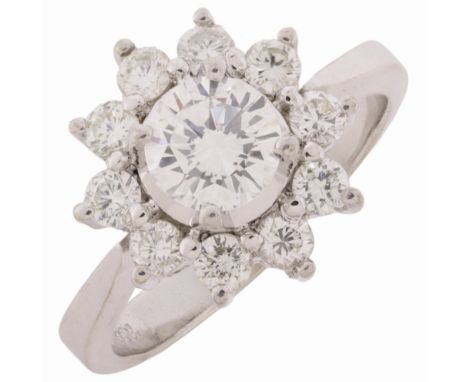 A Diamond Cluster Ring,the flowerhead set with modern round brilliant cut diamonds, the diamonds totalling approximately 1.00