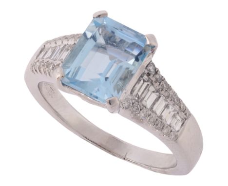 An Aquamarine and Diamond Ring,set with an octagonal step cut aquamarine of approximately 2.15 carats, the tapered shoulders 