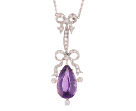 A Belle Epoque Amethyst and Diamond Pendant Necklace,circa 1910, comprising a ribbon bow set with round and rose cut diamonds