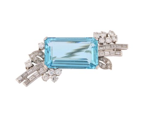 An Aquamarine and Diamond Brooch,circa 1950s, set with an elongated octagonal step cut aquamarine weighing approximately 20.0