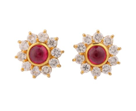 A Pair of Ruby and Diamond Cluster Stud Earrings,each set with a central round cabochon ruby of approximately 0.50 carats, su