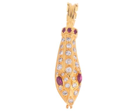 A Ruby and Diamond Snake Head Pendant,modelled as a snake head with open mouth showing fangs and tongue, the head pave set wi