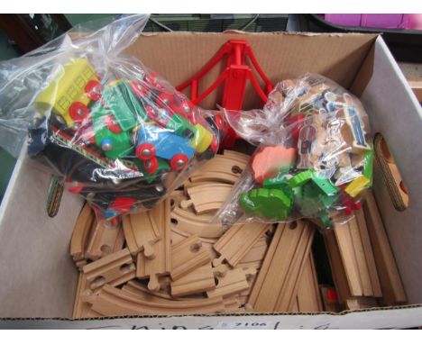 A collection of Brio wooden model railway pieces to include 3 bridges, tunnel, turntable, level crossing, engine shed, water 
